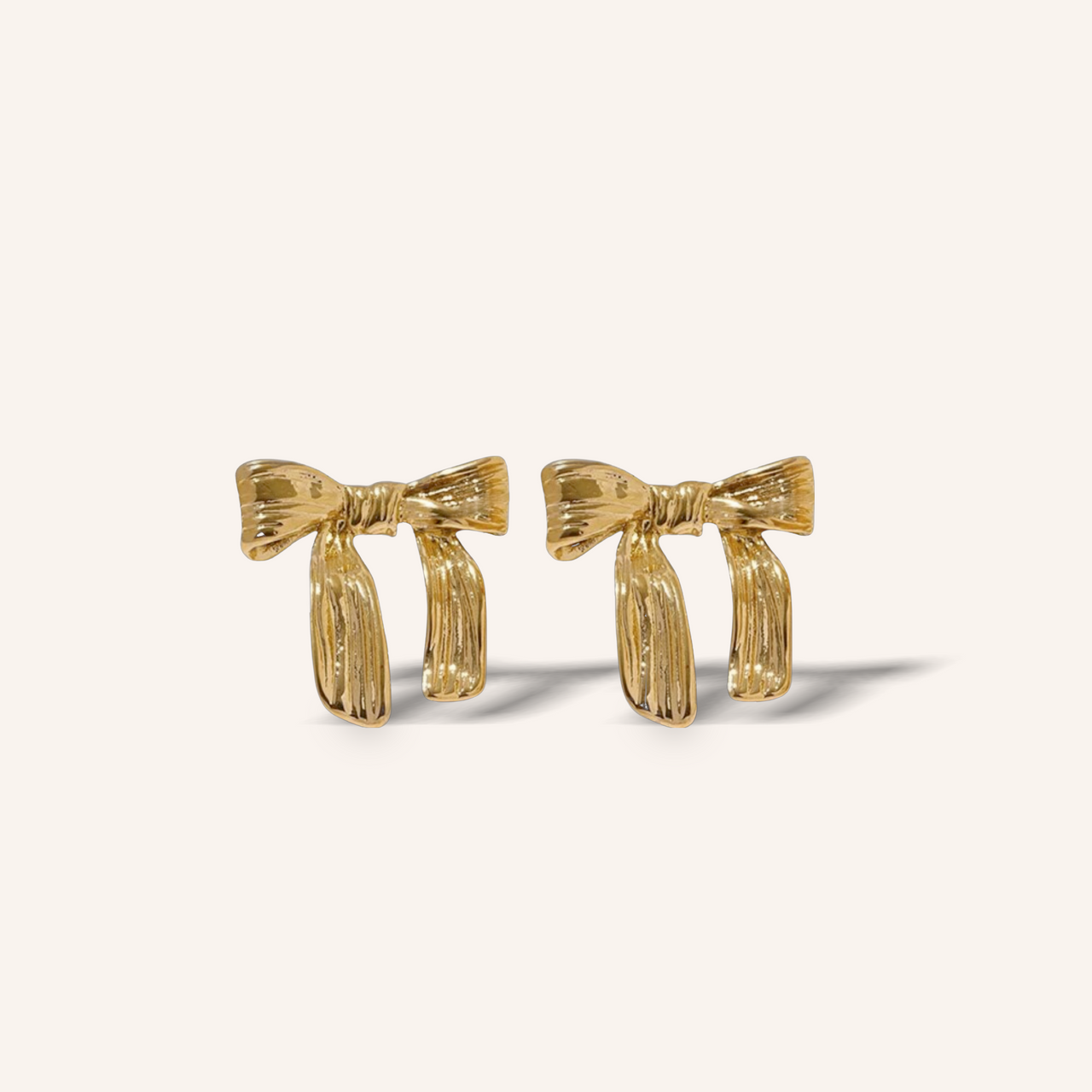 Mini gold bow 💧