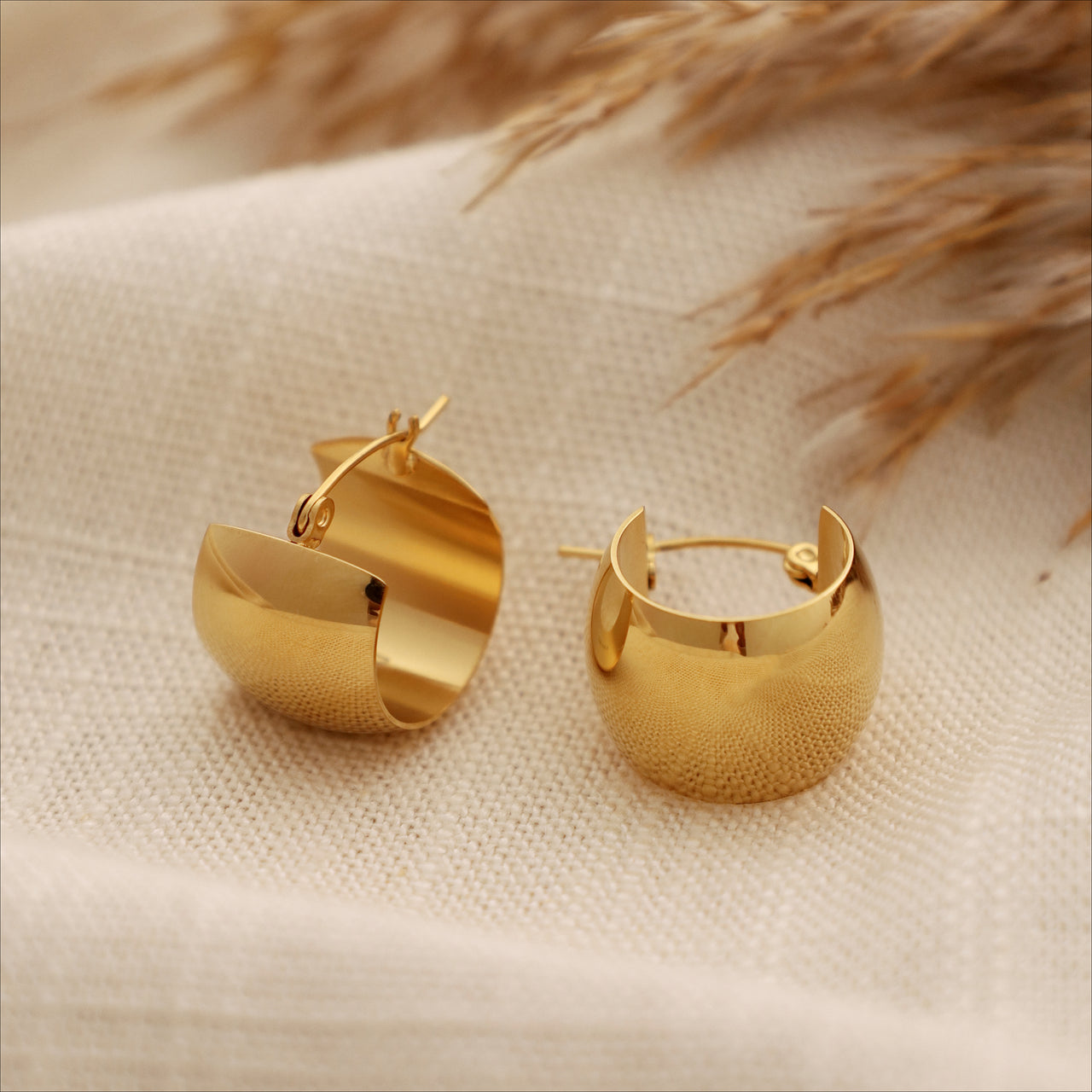 Stormy gold hoops